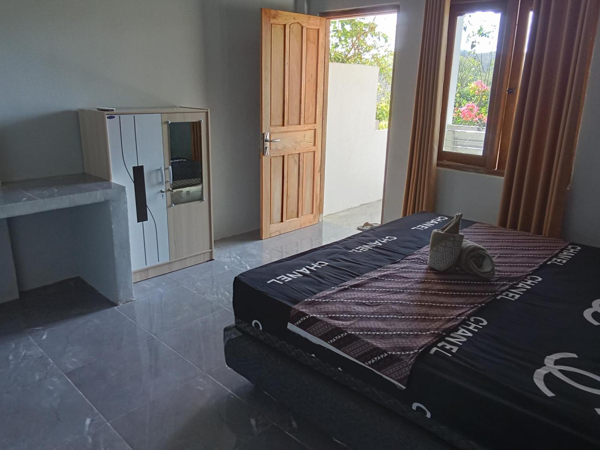Feby'S Homestay Ekas Zimmer foto
